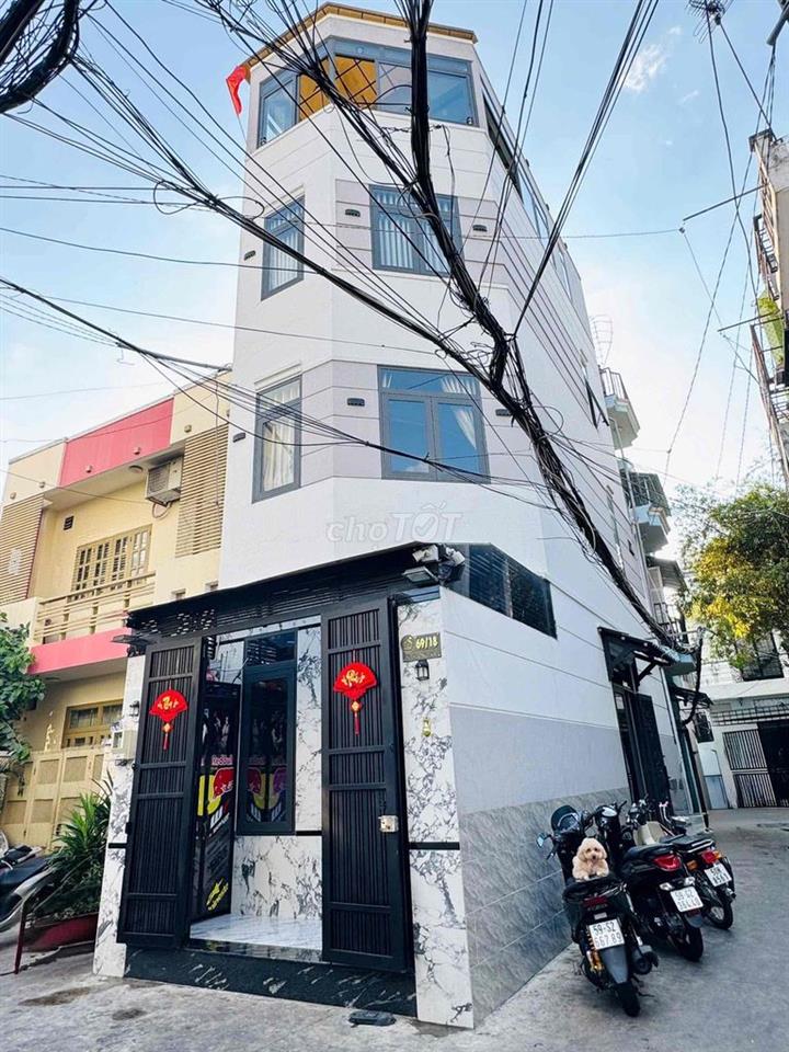 nhà góc 2 mặt tiền hẻm xe hơi đậu trước cửa , ngay chợ gò Vấp