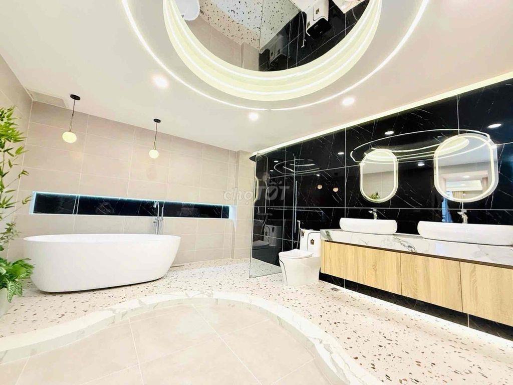 nhà 4 tầng. 65m2. ngang 4.5m. 4pn. Huỳnh Văn nghệ. gò vấp