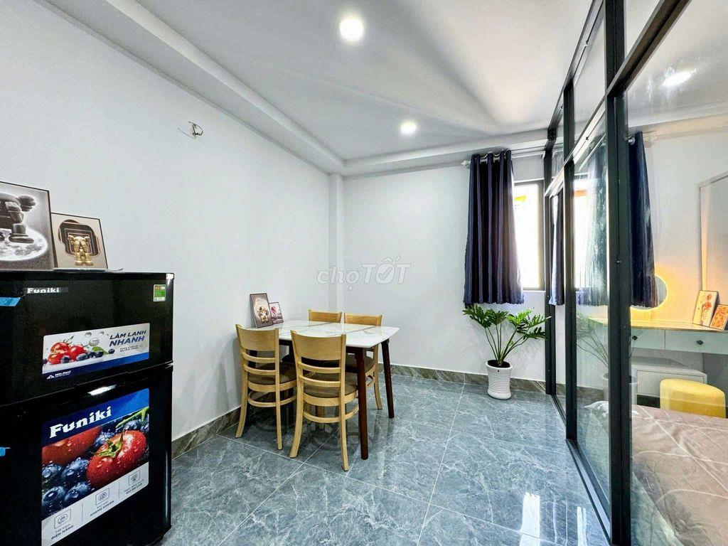 Tòa nhà 90m2 có thang máy Nở hậu 4 Lầu
