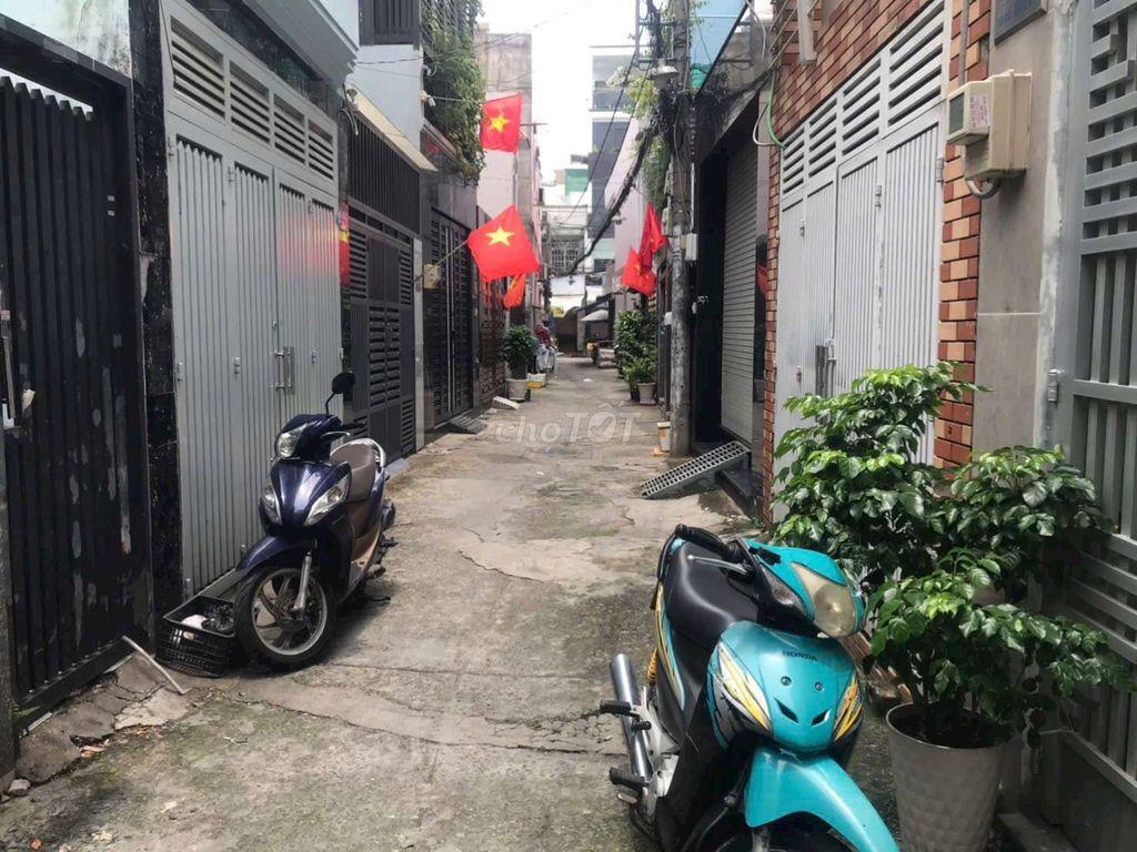 nhà hẻm 965 Quang Trung p14, 5x18m, 1 lầu, 3pn, sân xe