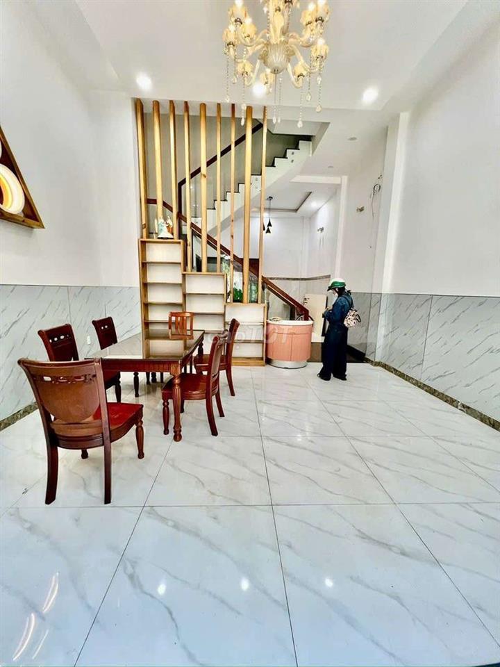 Cho Thuê Nhà Ngay Cầu An Lộc DT 4x20 1Trệt 3Lầu 5Pn 6Wc Sân Ôtô 7 Chổ