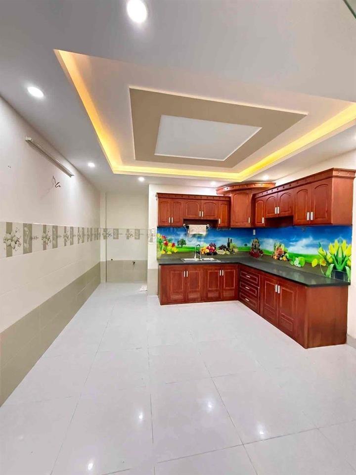 Cho Thuê Nhà Mới Đẹp DT 200m2 1Trệt 1Lửng 2Lầu 4Pn 4Wc Hẻm Xe Tải