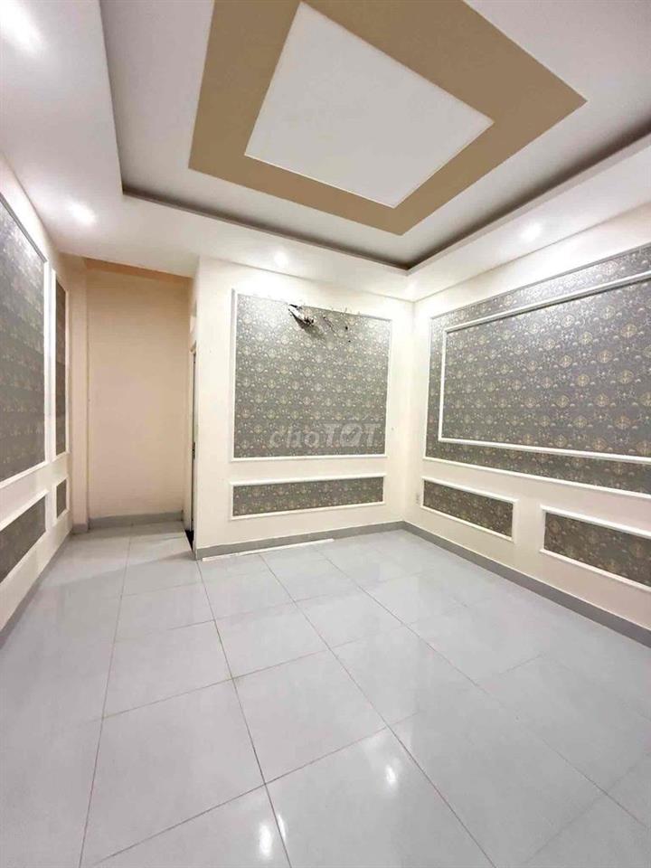 Cho Thuê Nhà Mới Đẹp DT 200m2 1Trệt 1Lửng 2Lầu 4Pn 4Wc Hẻm Xe Tải