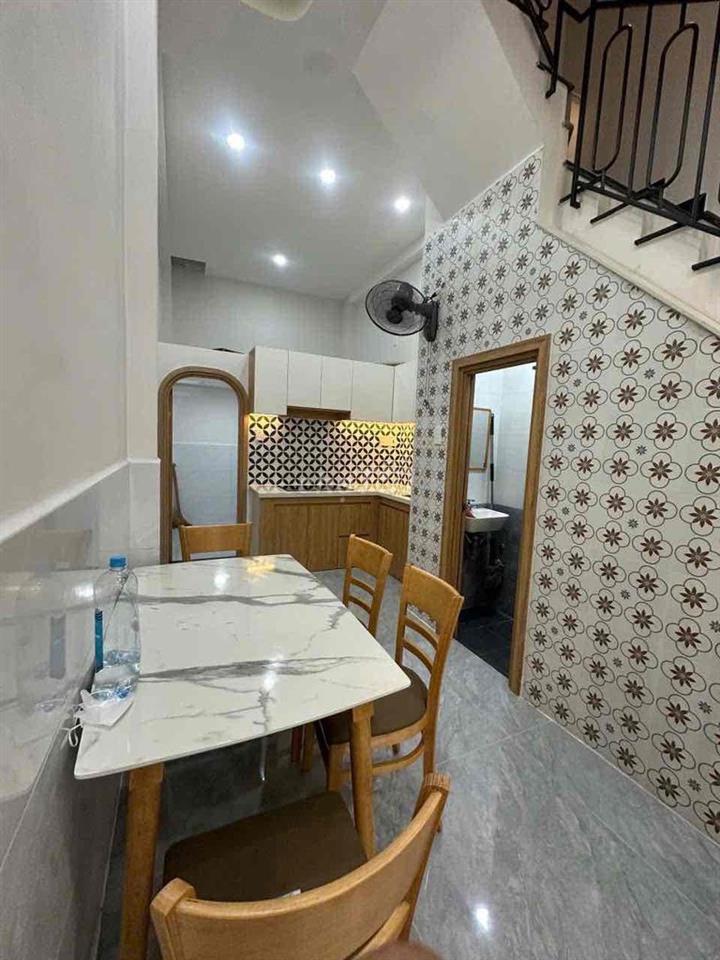 * Nhà nguyên căn mặt tiền 153 Thống Nhất, P11