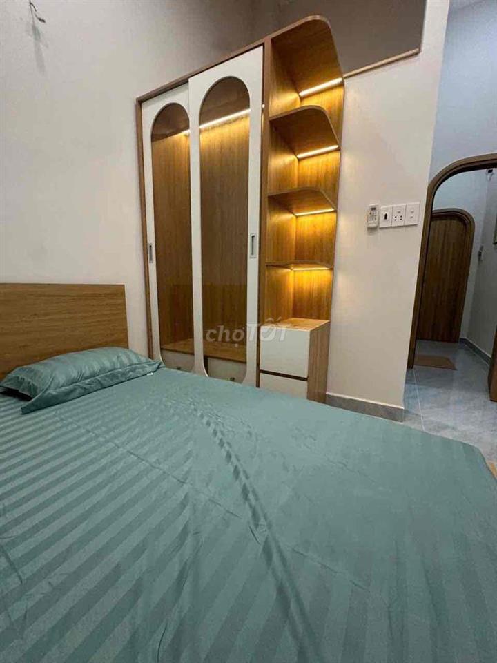 * Nhà nguyên căn mặt tiền 153 Thống Nhất, P11