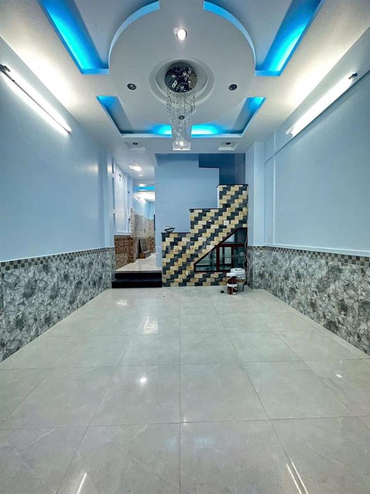 nhà mới sơn sửa 4x14m 3 lầu 4pn 4wc hẻm ô tô 6m vào ở ngay 