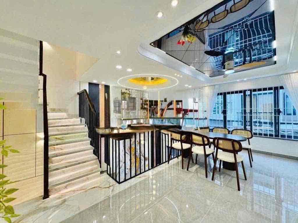 cho thuê nhà 163 nguyễn duy cung (6,5x7) lửng , 3 lầu , 3pn 4wc