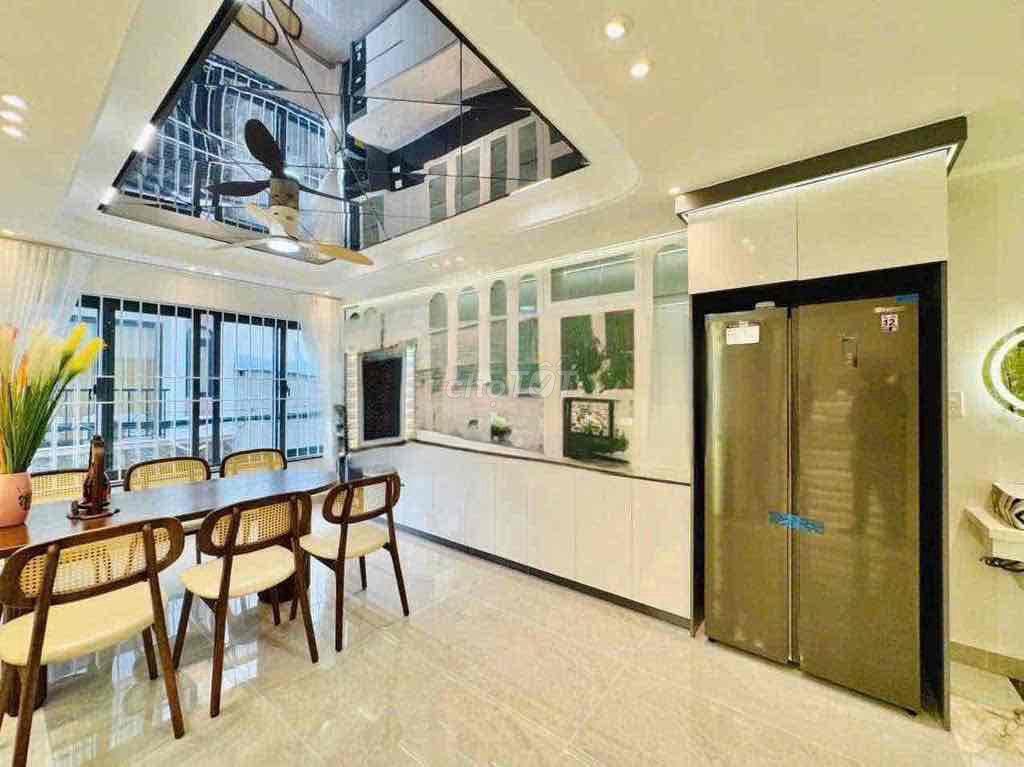 cho thuê nhà 163 nguyễn duy cung (6,5x7) lửng , 3 lầu , 3pn 4wc