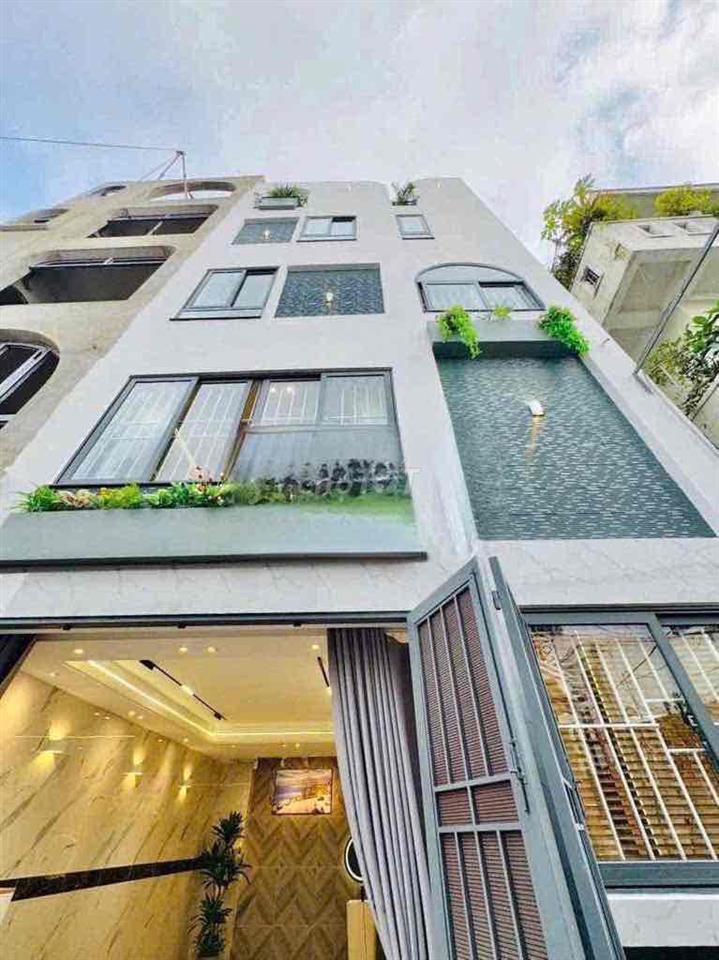 cho thuê nhà 163 nguyễn duy cung (6,5x7) lửng , 3 lầu , 3pn 4wc