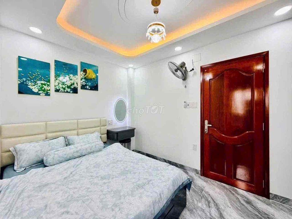 cho thuê nhà Nguyễn Tư giãn p12(4x13) lửng , 3 lầu , 5pn , 6wc full