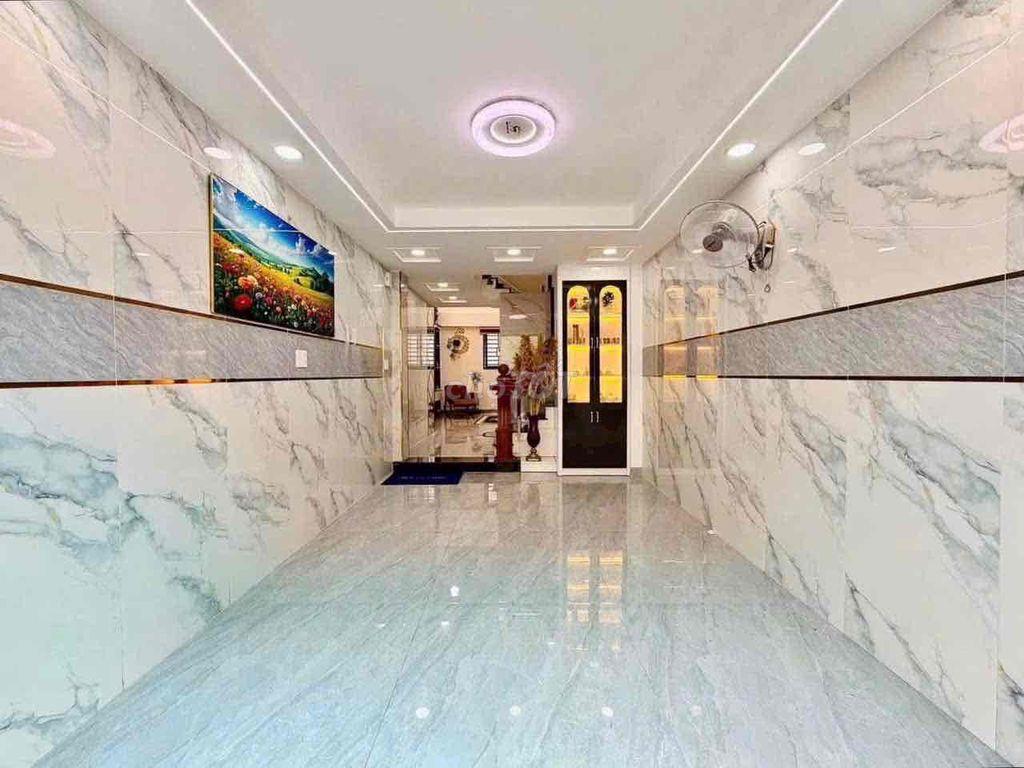 cho thuê nhà Nguyễn Tư giãn p12(4x13) lửng , 3 lầu , 5pn , 6wc full
