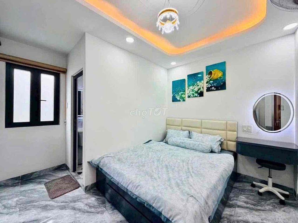 cho thuê nhà Nguyễn Tư giãn p12(4x13) lửng , 3 lầu , 5pn , 6wc full