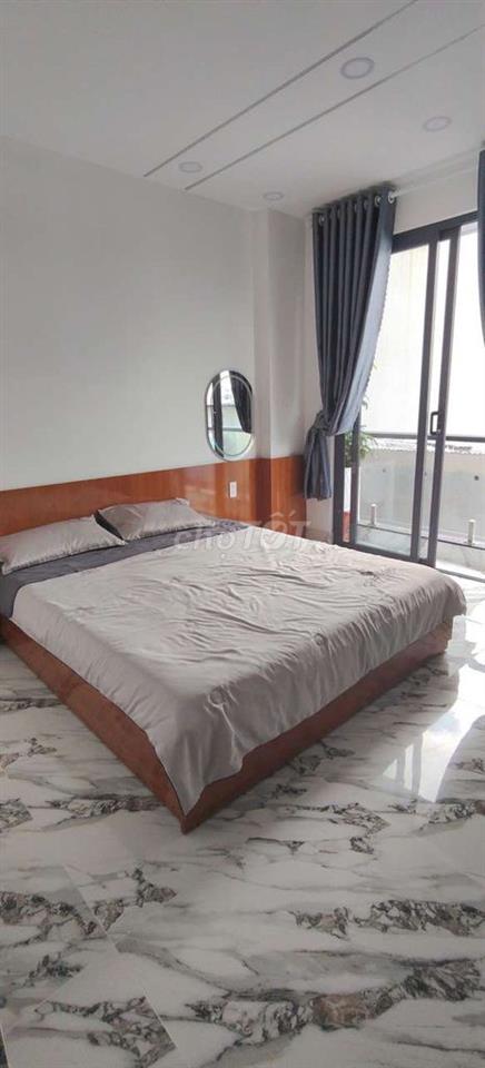 Cần Bán Gầp nhà Đường TTN2 Hẻm xe hơi DT 4,2 x13,5 1 trệt 1Lửng 3 Lầu