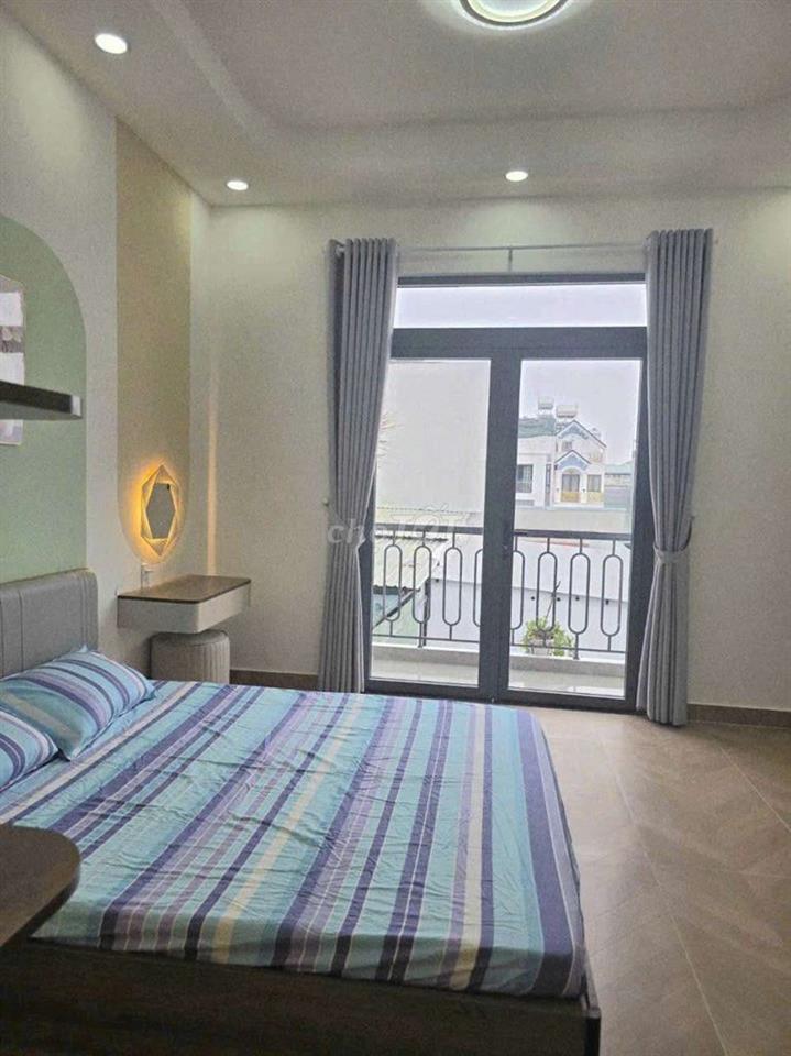 Nhà mới 4×15m 1 trệt 2 lầu 4pn 5wc 61m2 HXH Hiệp Bình