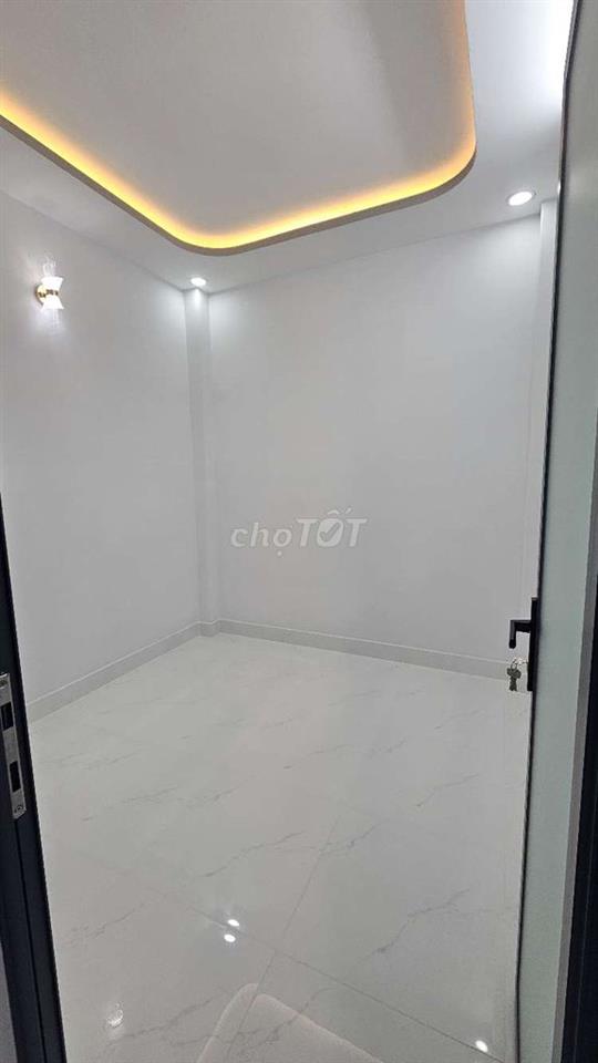 Nhà mới 3 tầng 4 phòng ngủ sổ hồng riêng ở quận 7 ngay trung tâm.