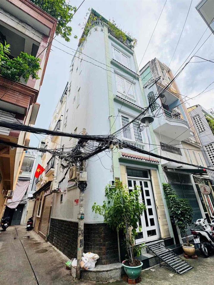 BÁN NHÀ HẼM XE HƠI TRẦN HƯNG ĐẠO Q1 5 TẦNG GIÁ 7.9 TỶ THƯƠNG LƯỢNG