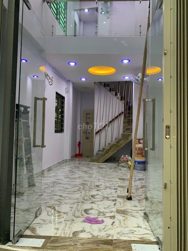 Nhà mới 4 lầu mặt tiền Lý Thái Tổ giá 15 triệu 