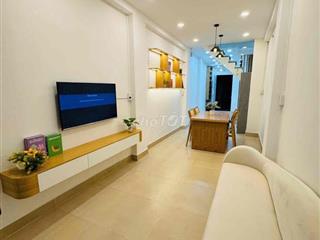 Bán nhà mới quận 10 , 2 mặt tiền hẻm xe hơi 6 tỉ 150 triệu