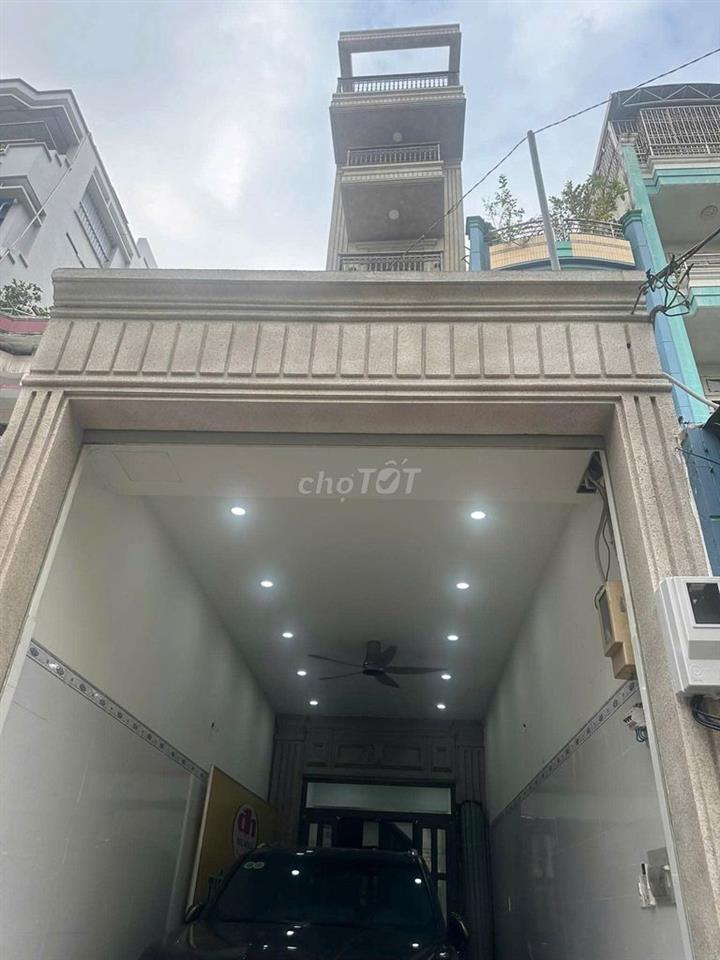 Nhà 1 trệt 5 lầu có thang máy Mặt Tiền đường Âu Cơ