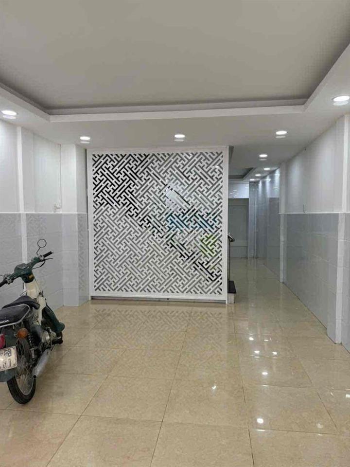 Nhà nguyên căn MT đường 12m Phan Xích Long