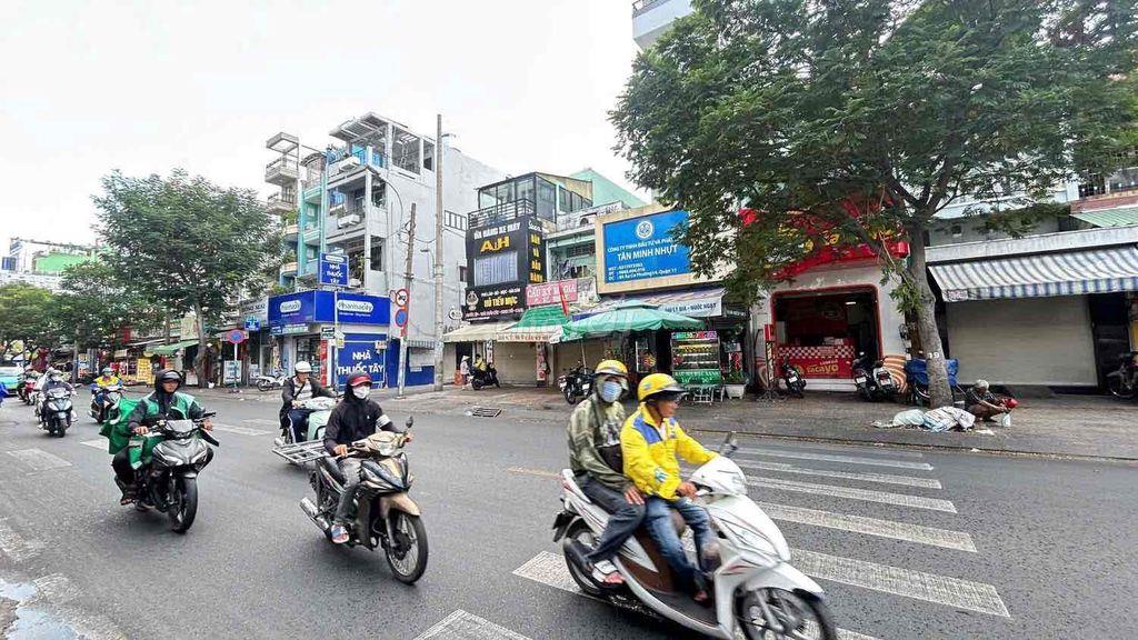 nhà nguyên căn mặt tiền sầm uất q11