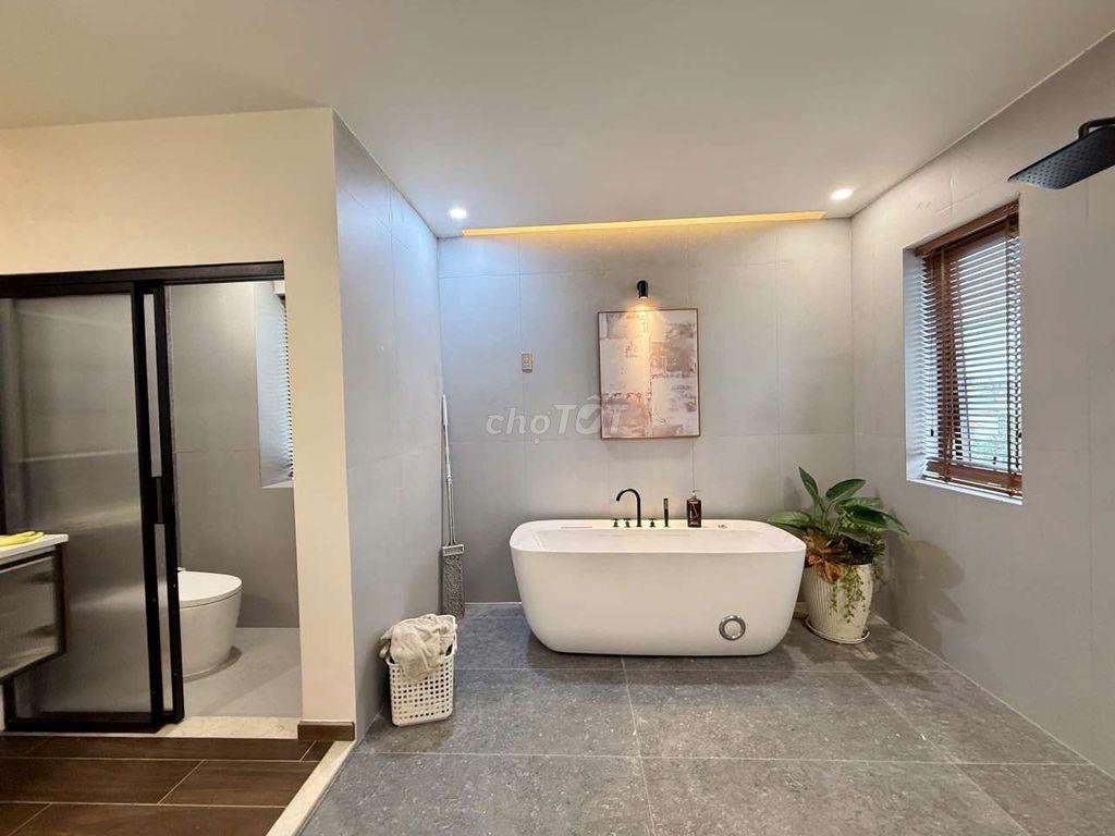 Nhà tâm huyết thang máy sân vườn rộng 50m2 Mặt Tiền Trần Thị Cờ