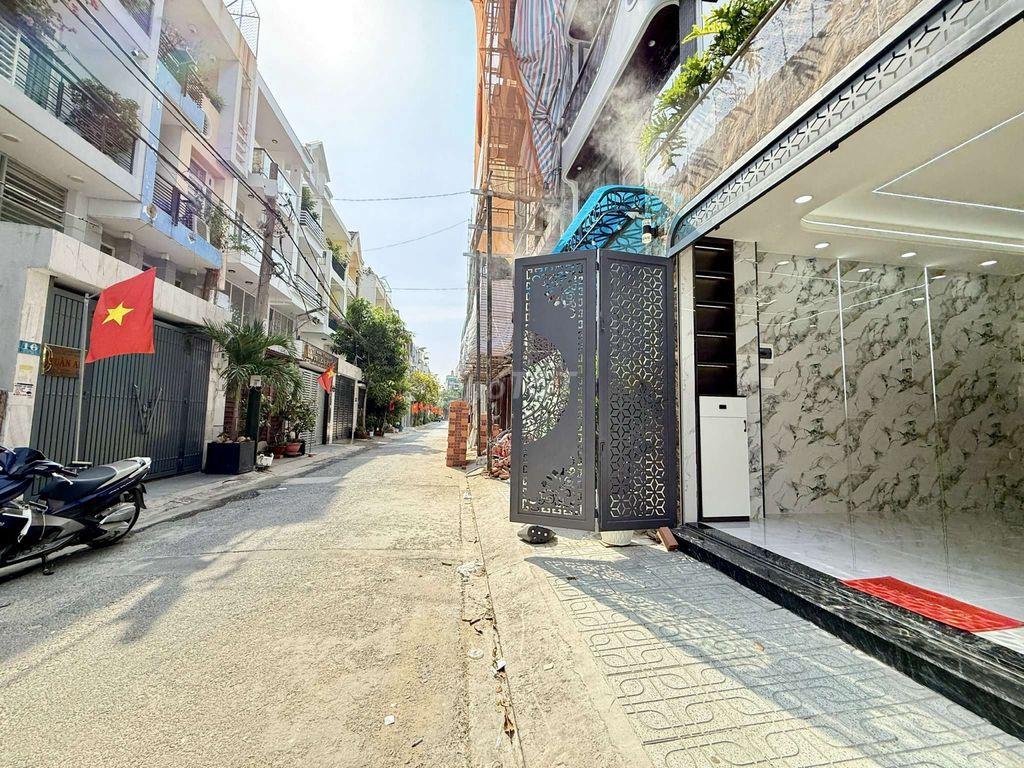 Siêu Phẩm 4 Tầng hẻm 7m thông Đường Nguyễn Văn Quá. Ngay KDC An Sương