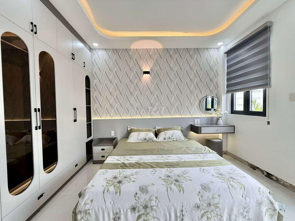 Nhỉnh 8 tỷ Siêu Phẩm 4 Tầng có Thang Máy Hẻm 10m thông Trung Mỹ Tây 2A