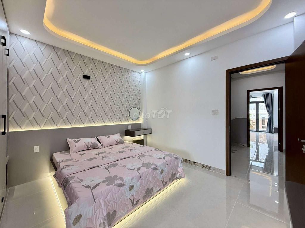 Nhỉnh 8 tỷ Siêu Phẩm 4 Tầng có Thang Máy Hẻm 10m thông Trung Mỹ Tây 2A
