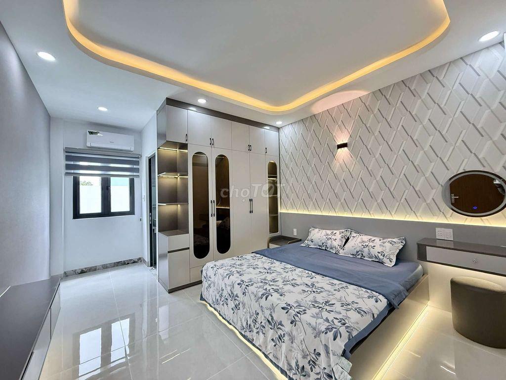 Nhỉnh 8 tỷ Siêu Phẩm 4 Tầng có Thang Máy Hẻm 10m thông Trung Mỹ Tây 2A