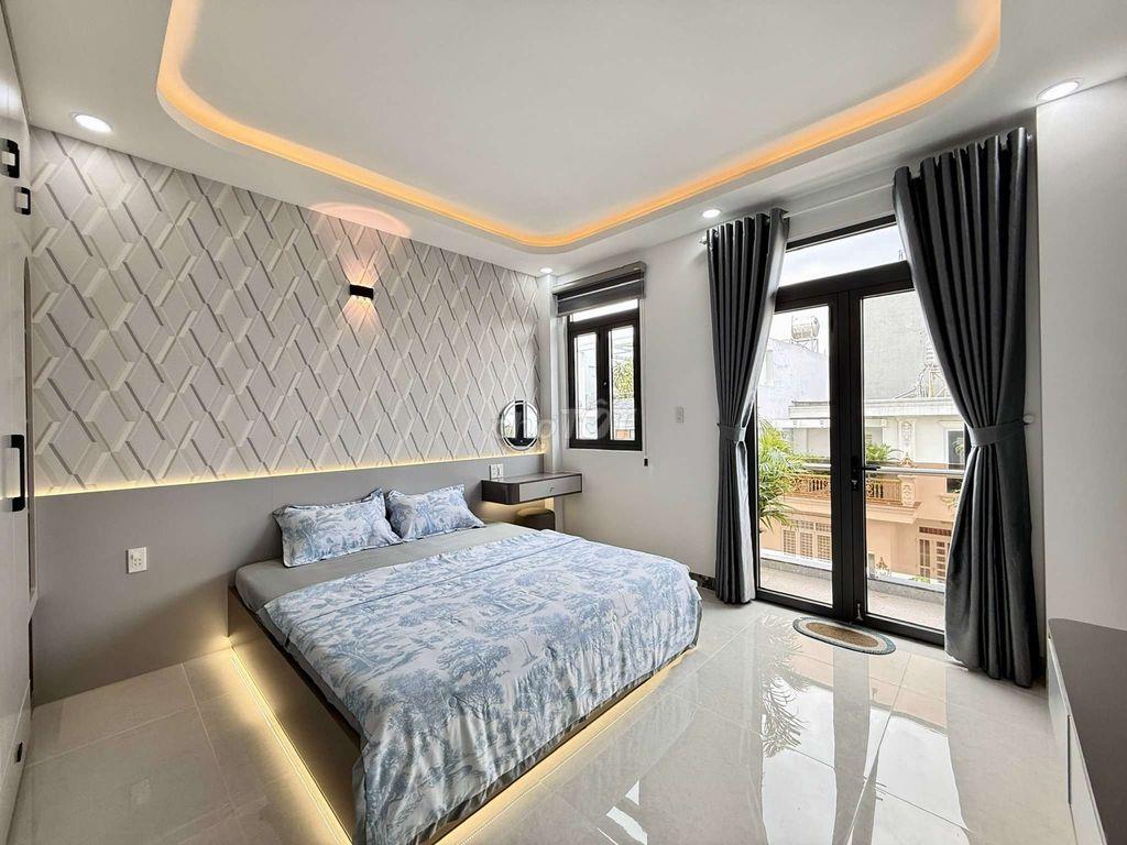 Nhỉnh 8 tỷ Siêu Phẩm 4 Tầng có Thang Máy Hẻm 10m thông Trung Mỹ Tây 2A