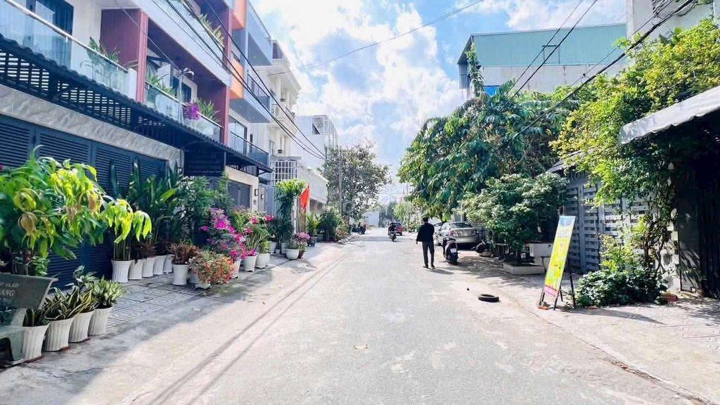 Nhà Phố 4m x 25m. 3 Tầng 7PN Hẻm 12m KDC Tân Tiến bờ Kè Tham Lương