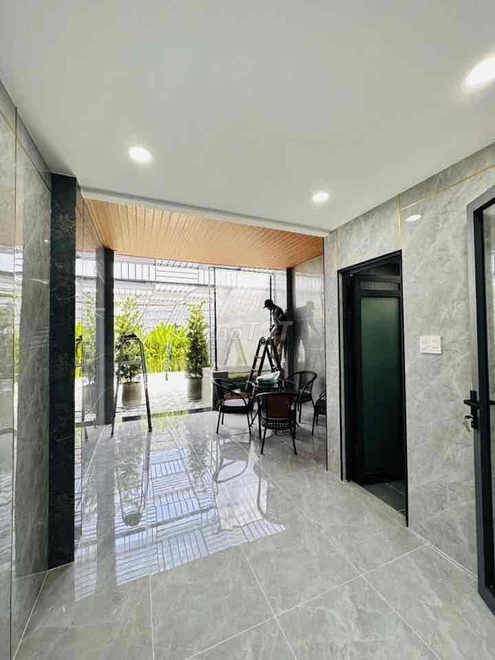 nhà phố quận 12 dài 28 m công nhận 110 m2