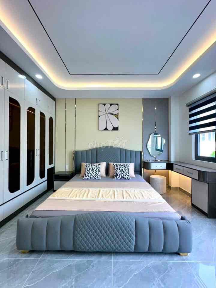 bán nhà mới trệt lửng 4 lầu, có thang máy phường trung mỹ tây