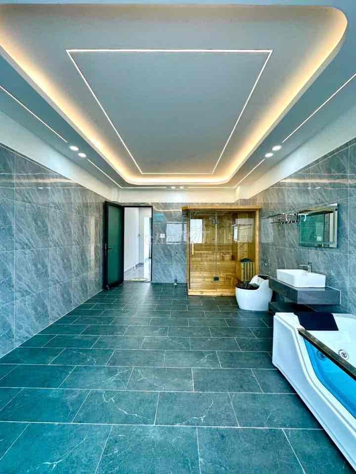bán nhà mới trệt lửng 4 lầu, có thang máy phường trung mỹ tây