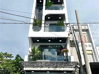 bán nhà mới trệt lửng 4 lầu, có thang máy phường trung mỹ tây