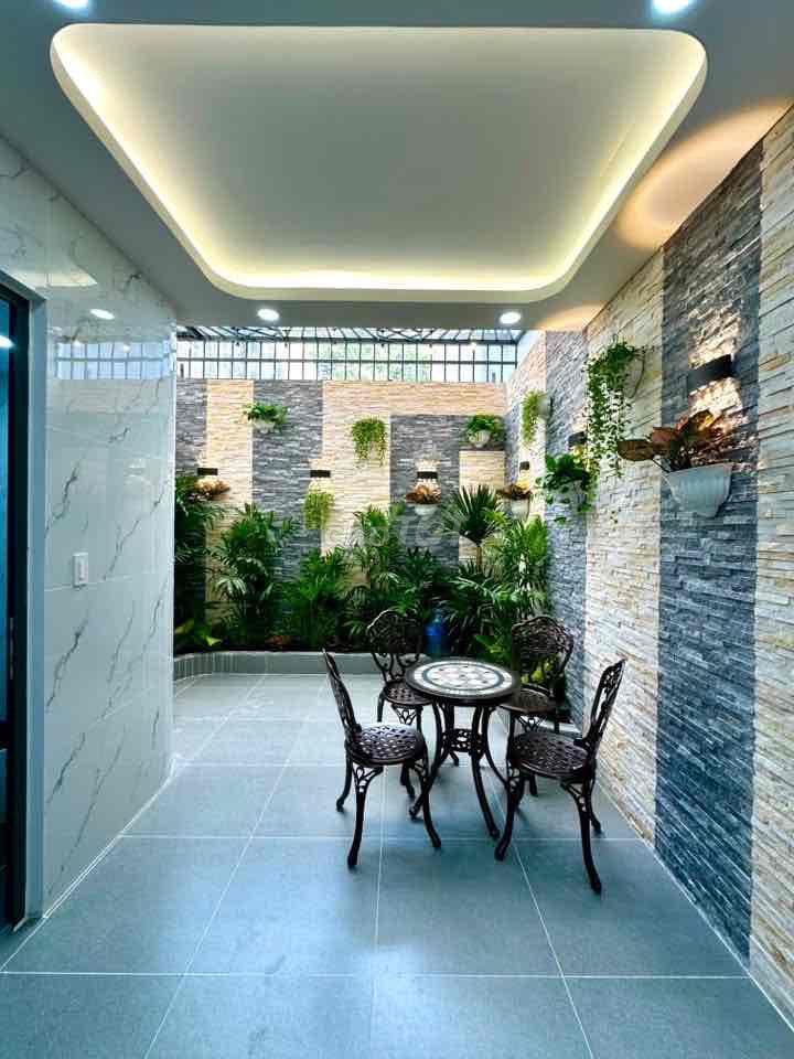 bán nhà mới trệt lửng 4 lầu, có thang máy phường trung mỹ tây