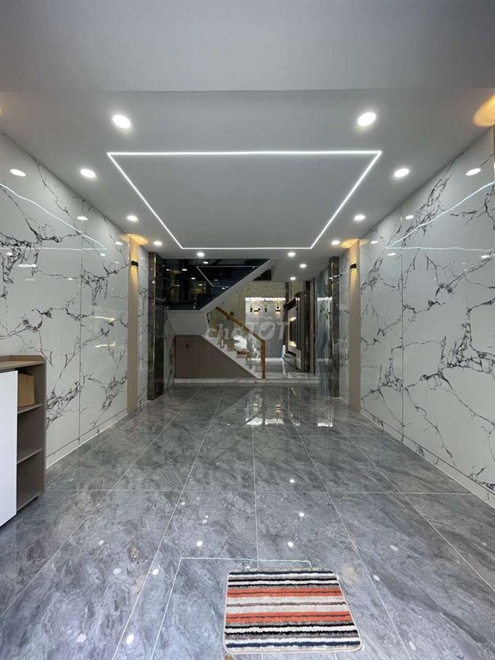 Nhà mới 3 lầu, 4m x14m, có gara xe, gần Metro đường Lê Văn Khương