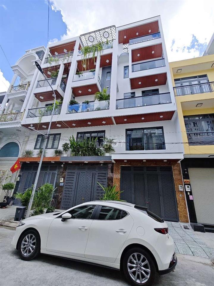 Nhà mới 3 lầu, 4m x14m, có gara xe, gần Metro đường Lê Văn Khương