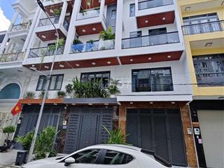 Nhà mới 3 lầu, 4m x14m, có gara xe, gần Metro đường Lê Văn Khương