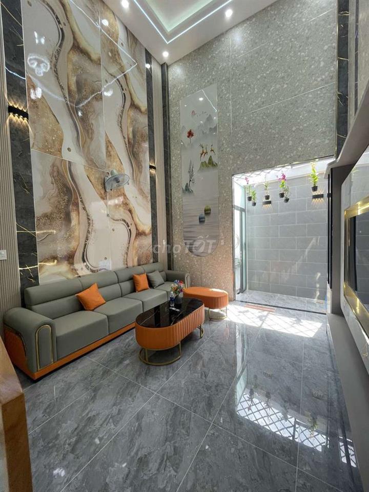 Nhà mới 3 lầu, 4m x14m, có gara xe, gần Metro đường Lê Văn Khương