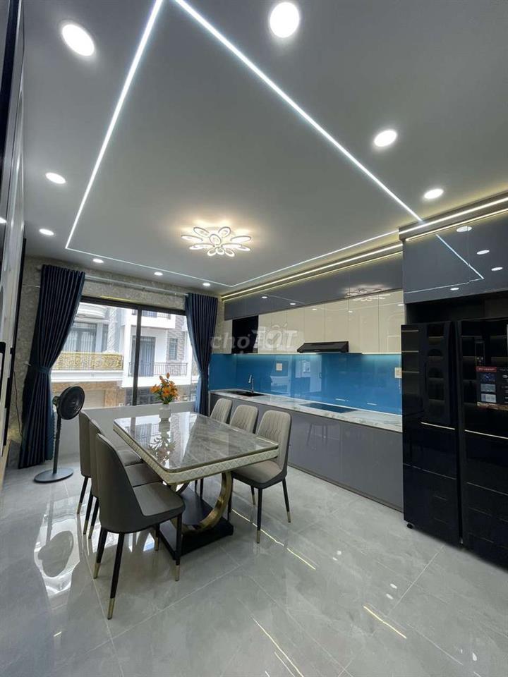 Nhà mới 3 lầu, 4m x14m, có gara xe, gần Metro đường Lê Văn Khương