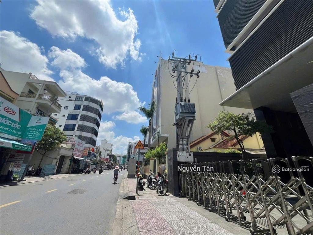 Building góc 2 mặt tiền nguyễn văn đậu hầm + 7 tầng thang máy