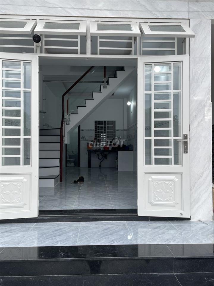 Nhà mới 4 phòng ngủ, 1 tret, 2 lầu, 5Wc, Sân trước, đường 10 tấn.