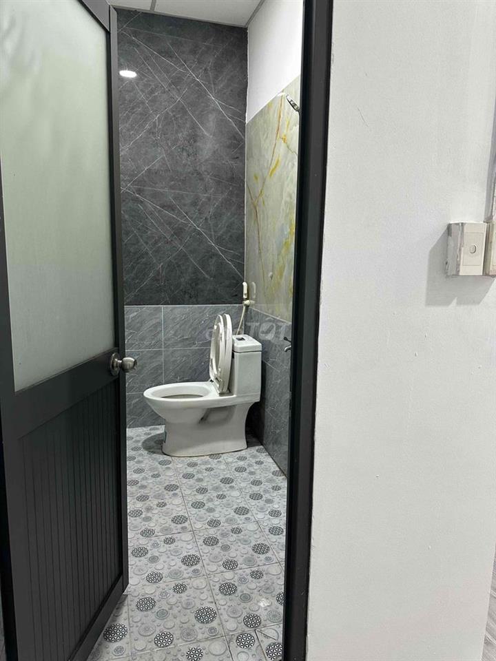 Dối diện bến xe An Sương