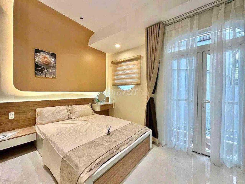 Cho thuê nhà đường CMT8 4x9 1 trệt 1 lửng 2 lầu 3pn 3wc full nt