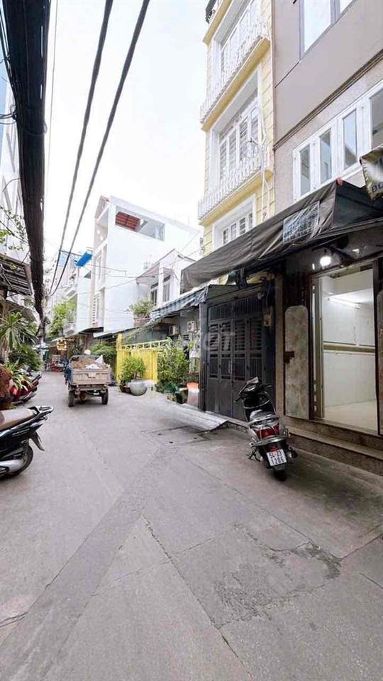 Nhà bán mt đường số Q.4