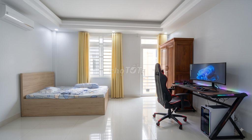 Thuê phòng 40m2 có ban công, máy giặt riêng, bếp chữ L ở Quận 7