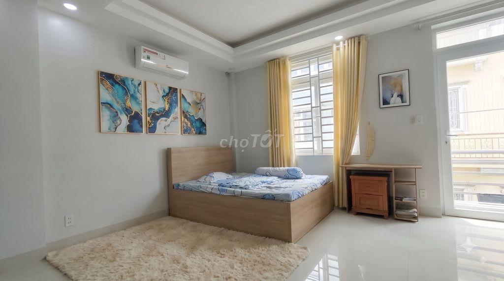 Thuê phòng 40m2 có ban công, máy giặt riêng, bếp chữ L ở Quận 7