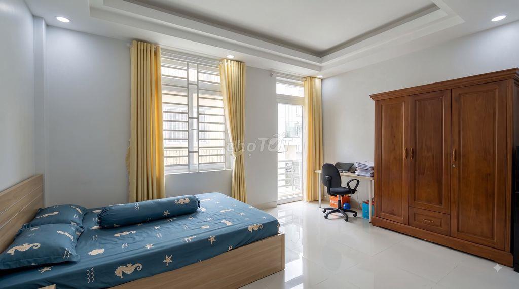 Thuê phòng 40m2 có ban công, máy giặt riêng, bếp chữ L ở Quận 7